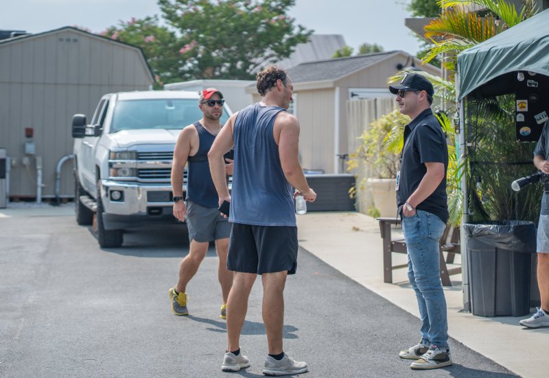 Steve Morgan, SNC baritone chats with band manager, David Britz, of Works Entertainment.